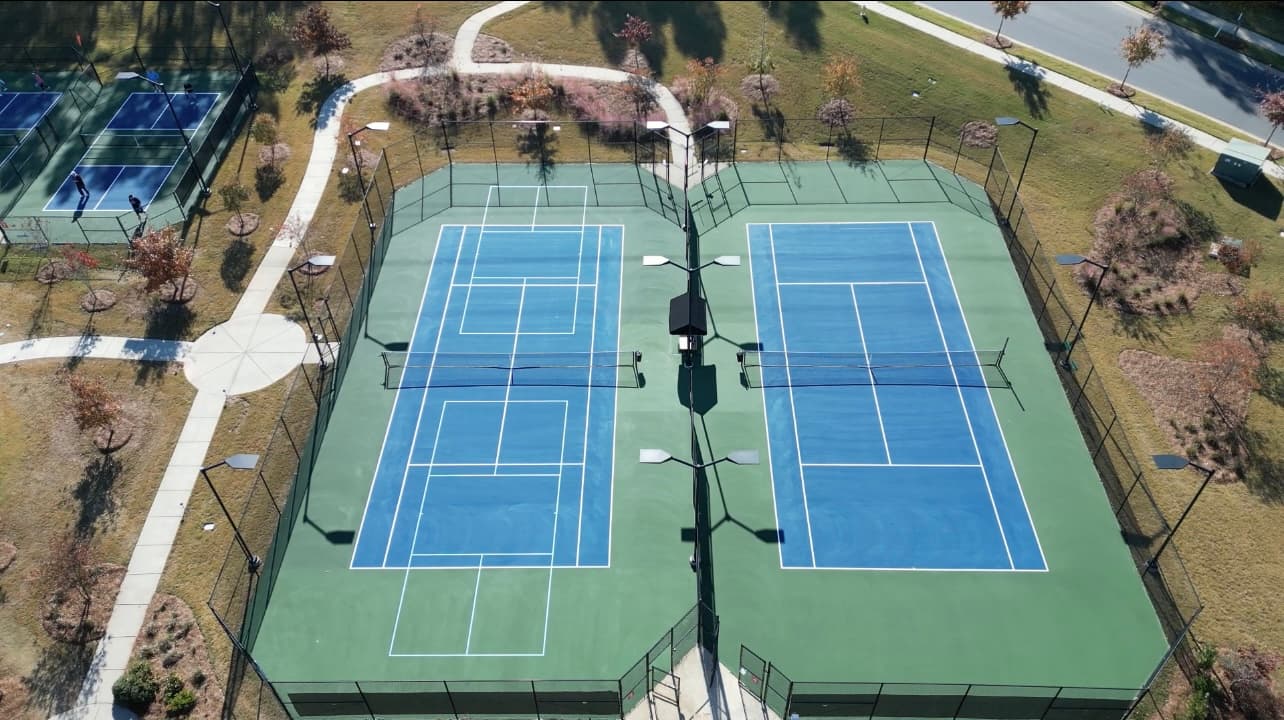 Multi-court tennis surfacing aerial view