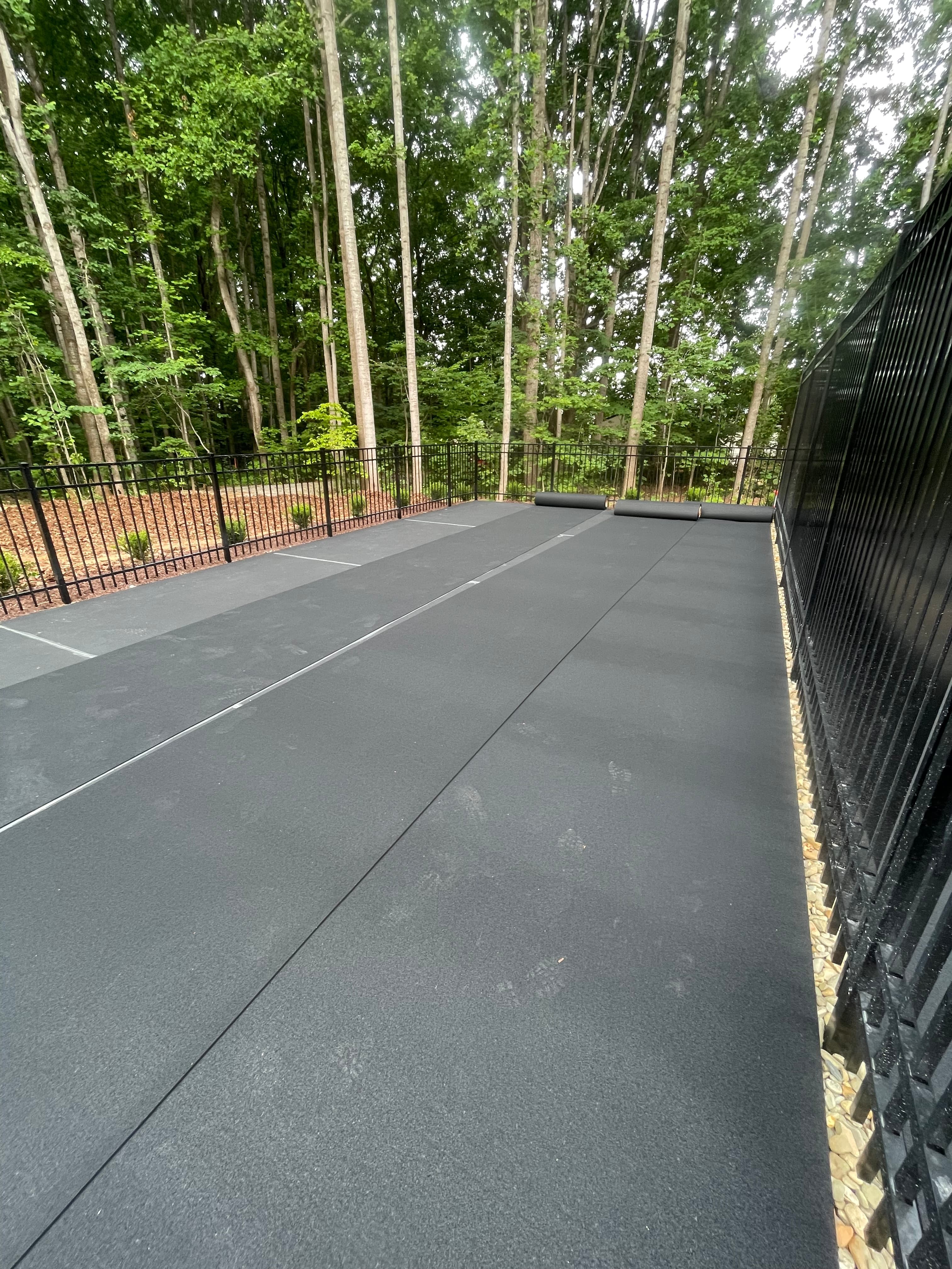 Rubber mat court installation