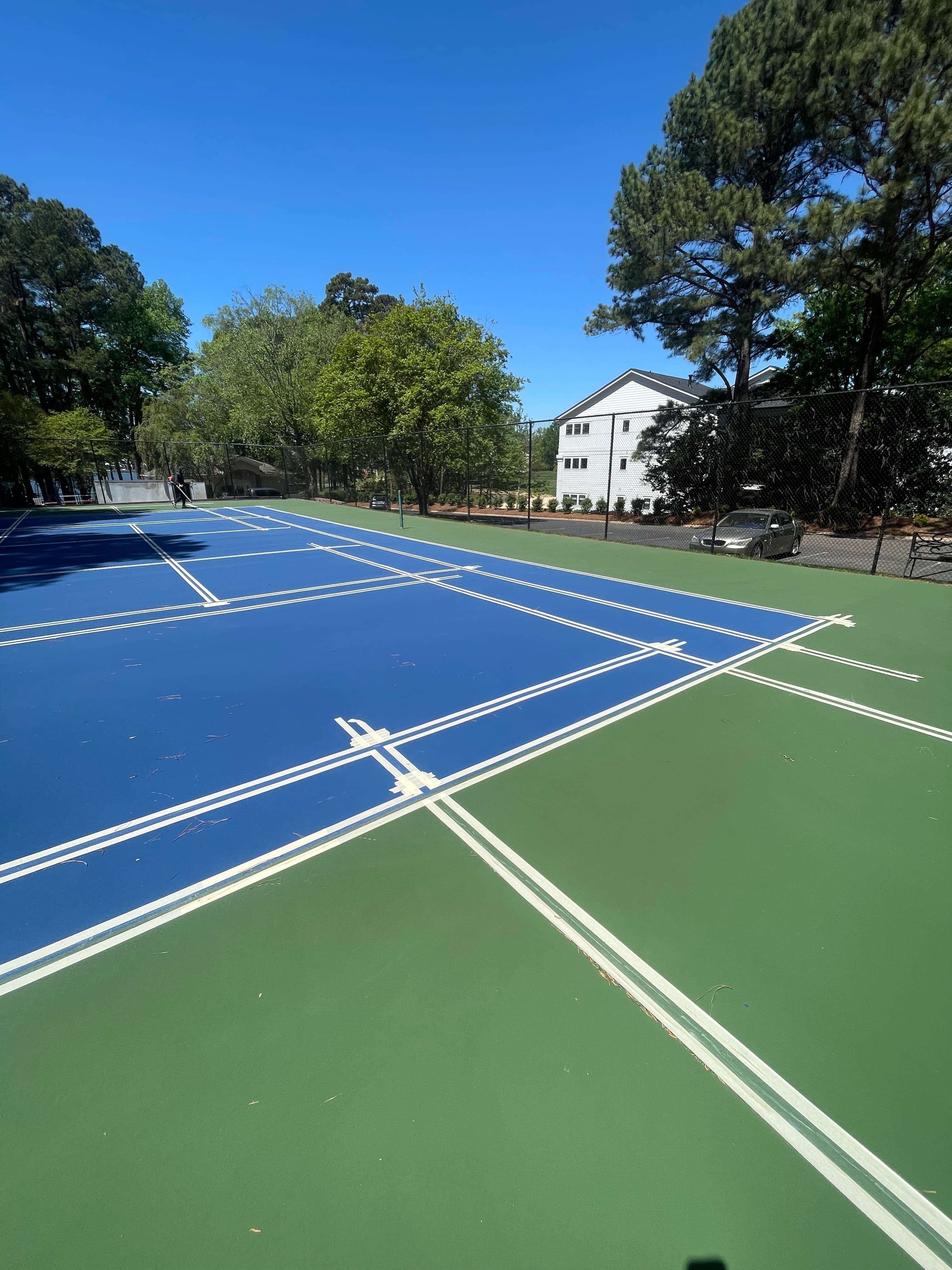 Tennis court with fresh line surfacing
